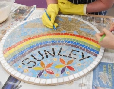 Patient makes beautiful mosaic sign to welcome people to their ward