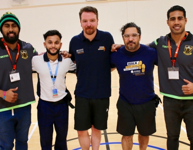 Northampton Saints players lead adolescent patients through the Haka 