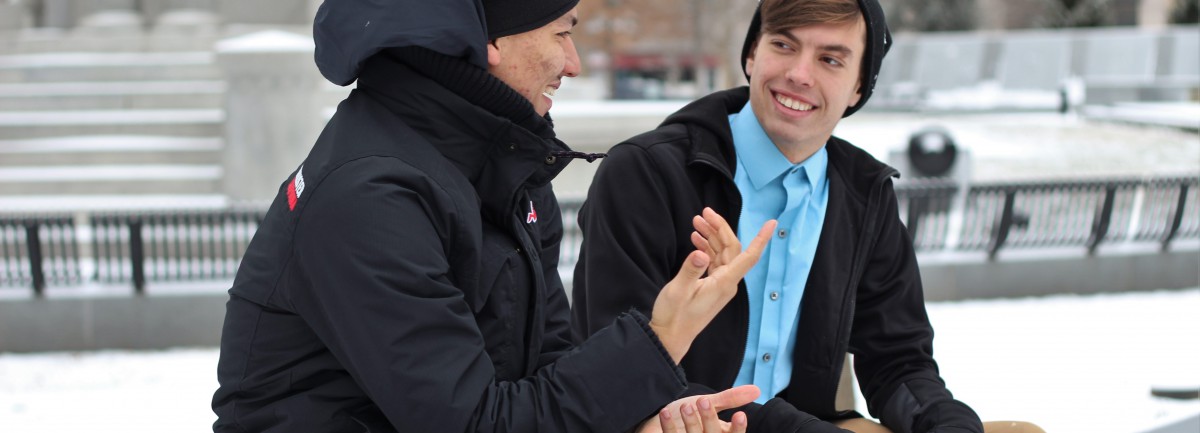 two guys chat